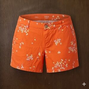 A.n.a size 6 twill short vibrant orange with pink, yellow and blue flowers.